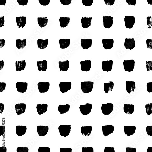 Grid seamless pattern with halved circles. Abstract geometric background with spots in a row. Vector black and white ornament with grunge dots or circles silhouettes. Dry brush texture. 