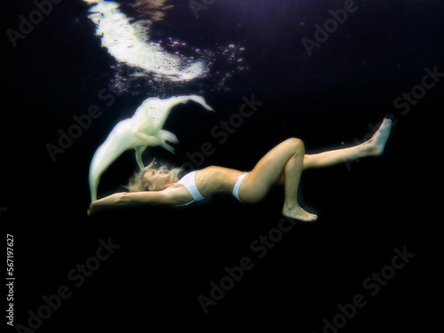 Lexia Smith underwater and under water fall in pool