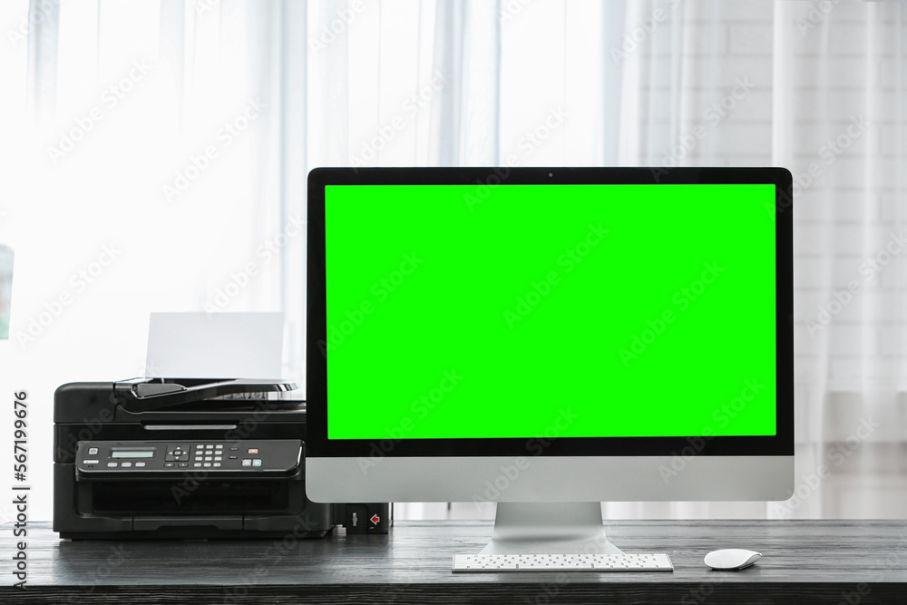 Computer display with chroma key on desk in room. Comfortable workplace Computer display with chroma key on desk in room. Comfortable workplace