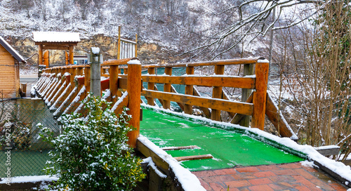wooden bridge in winter