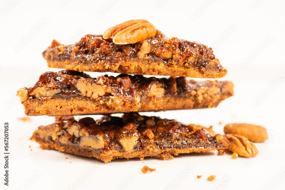 Golden crunchy fresh baked pecan diamond cookies made on a rich short dough. Golden crunchy fresh baked pecan diamond cookies made on a rich short dough.