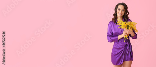 Smiling young woman with mi...