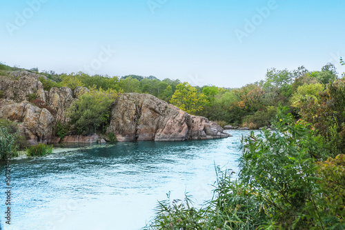 View of beautiful river with green trees and hill