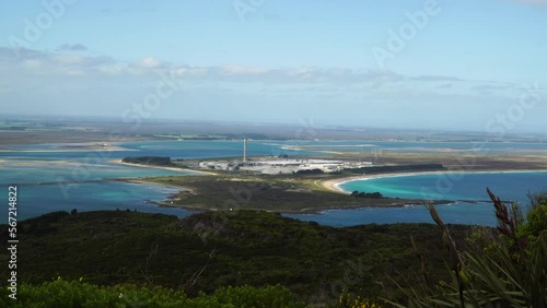 Zoom in to Tiwai Point Aluminium Smelter as seen from the top of Bluff Hill in New Zealand  photo