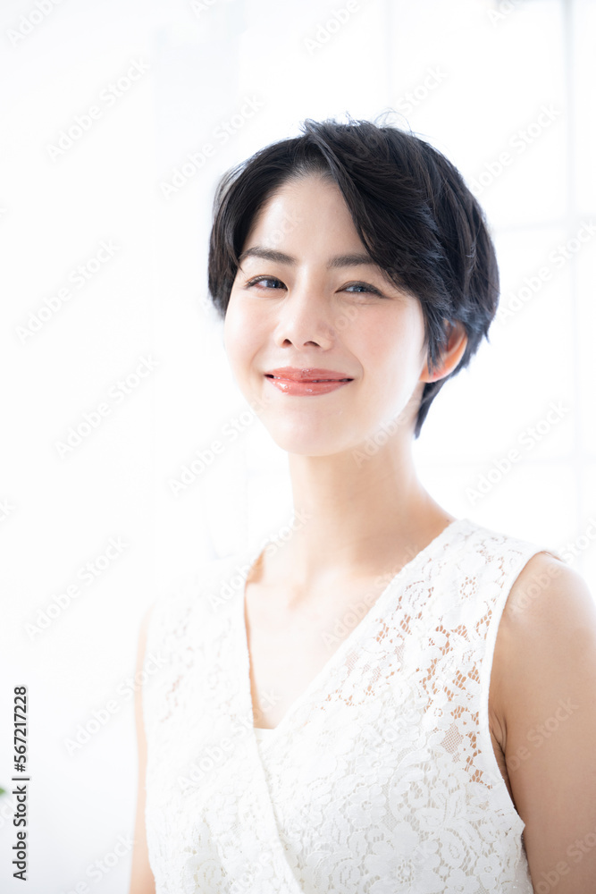 Beautiful woman looking at the camera, realizing the benefits of easy-to-use skin care for beauty. Beautiful woman looking at the camera, realizing the benefits of easy-to-use skin care for beauty.