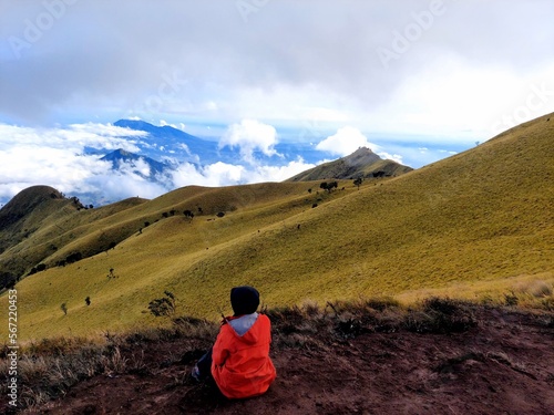 Mount Merbabu, Central Java, Indonesia – August 07, 2022: Standing On The Savanna With Views Of The Sea Of Clouds At Puncak Swanting