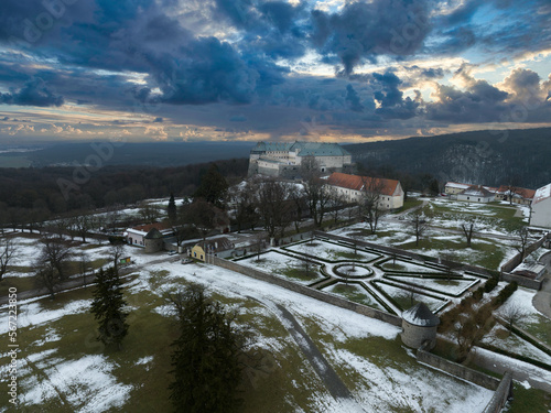 Aerial view of Cerveny Kamen (Vorosko, Red stone) castle a former stronghold of a noble family with four round bastions for cannon gun platforms in the Carpathian mountains in Slovakia dramatic sunset