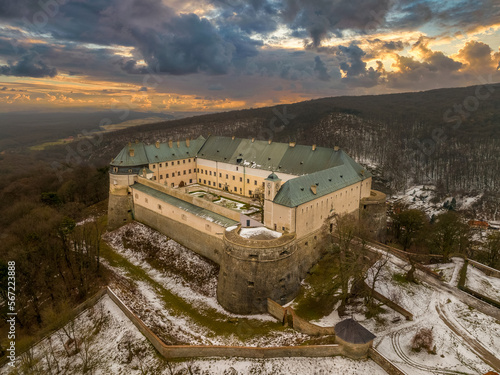Aerial view of Cerveny Kamen (Vorosko, Red stone) castle a former stronghold of a noble family with four round bastions for cannon gun platforms in the Carpathian mountains in Slovakia dramatic sunset