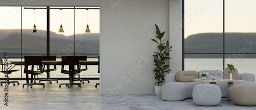 Modern and comfortable company office interior with formal meeting room and relaxation area photo