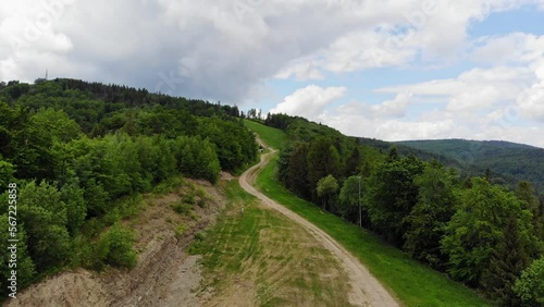 Hiking trail to Jaworzyna Krynicka summit on summer day, Beskid moutain, Poland, aerial photo