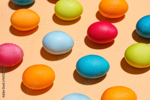 Colorful easter eggs on bei...