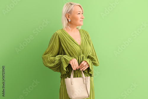 Stylish blonde mature woman...