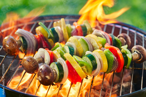 vegan barbecue skewers grilling on charcoal grill