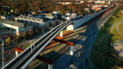 Light passenger rail operating at overpass in Charlotte, North Carolina.