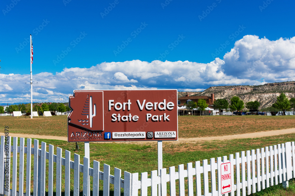 Fort Verde State Park sign at the white fence during Fort Verde Days