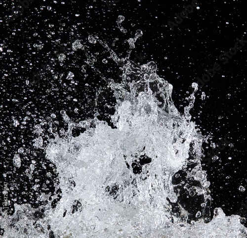 Water splash isolated on black background