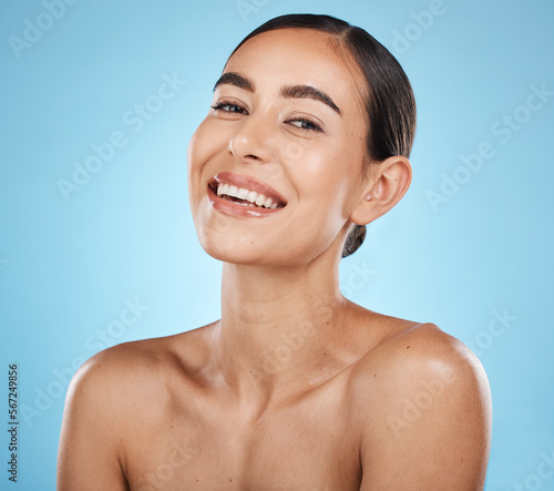 Принти на полотні Portrait, beauty and skin with a model woman in studio on a blue background for natural treatment