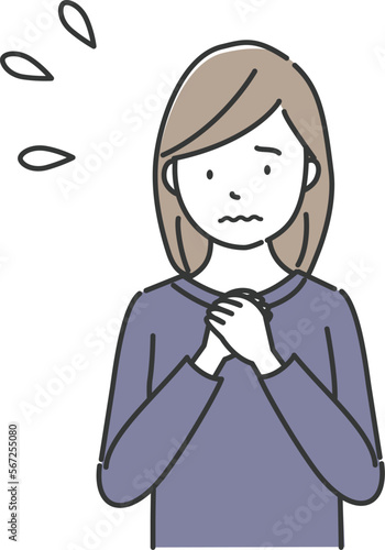 胸に手を当てて緊張している女性