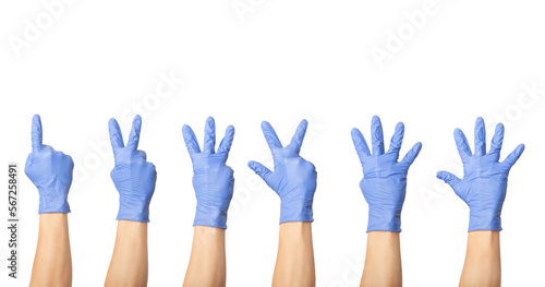 Hands in blue gloves