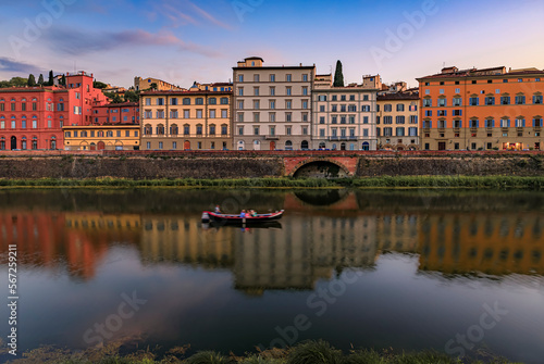 Sunset cityscape with waterfront houses on Arno River  Florence  Italy