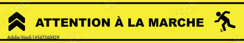 ATTENTION À LA MARCHE text on yellow background. MIND YOUR STEP in french language.