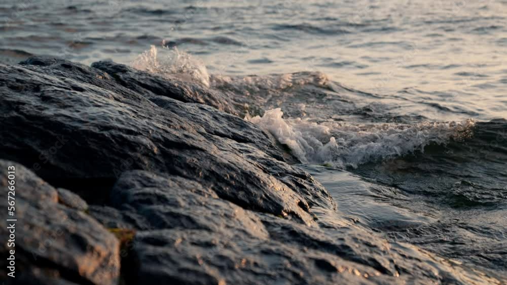 Close-up Of Waves Flowing Near The Rocks Close-up Of Waves Flowing Near The Rocks