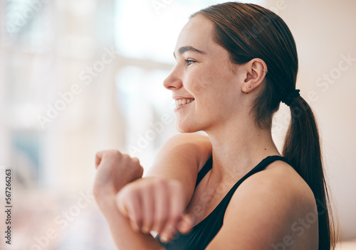Stretching arms, happy and woman ready for fitness, training and exercise for morning energy. Freedom, gym and girl smiling for a warm up before a workout, sports or thinking of motivation for cardio © C. D./peopleimages.com