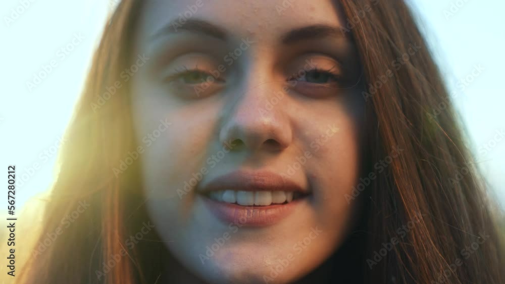 Happy face of a happy girl. Open smile healthy teeth. Portrait of a girl in the sun. Cute teenager in nature. Cheerful cute girl look at the camera. Dream girl in the park cheerful smile of teenager. Happy face of a happy girl. Open smile healthy teeth. Portrait of a girl in the sun. Cute teenager in nature. Cheerful cute girl look at the camera. Dream girl in the park cheerful smile of teenager.