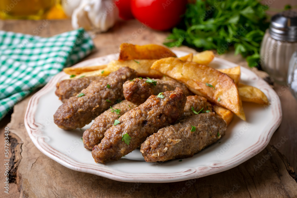 Traditional Turkish food; dry meatballs or inegöl meatballs with potatoes (Turkish name; Kuru kofte or anne koftesi) Traditional Turkish food; dry meatballs or inegöl meatballs with potatoes (Turkish name; Kuru kofte or anne koftesi)