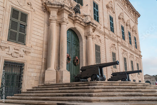 Il-Berġa ta' Kastilja building with cannons placed at the entrance in Valletta photo