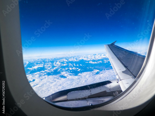 Aircraft wing and Alps from the plane window.