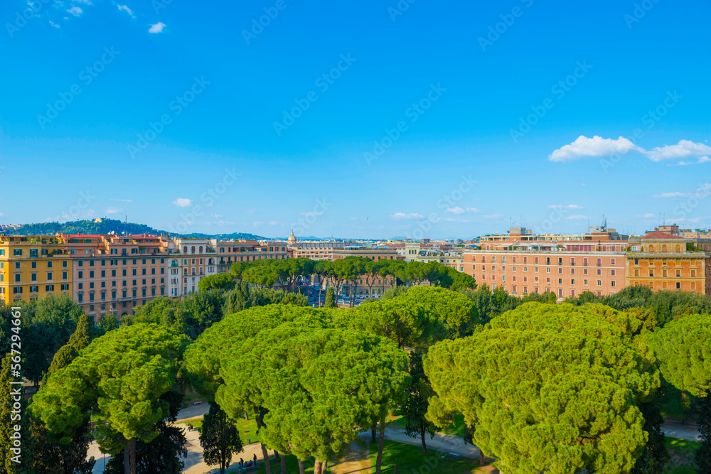 Cityscape and a Park with trees over Rome in a Sunny Day in Lazio, Italy.