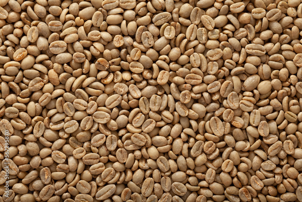 Top view macro photography shot of a bucket full of green raw un-roasted coffee beans Top view macro photography shot of a bucket full of green raw un-roasted coffee beans