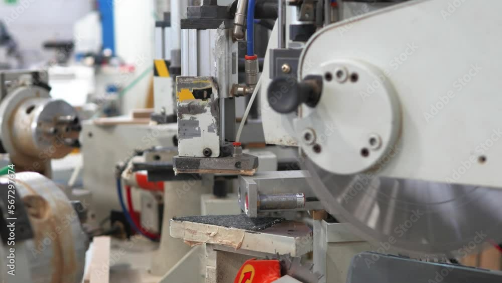 Process of industrial metalworking milling machine with circular saws in production Process of industrial metalworking milling machine with circular saws in production