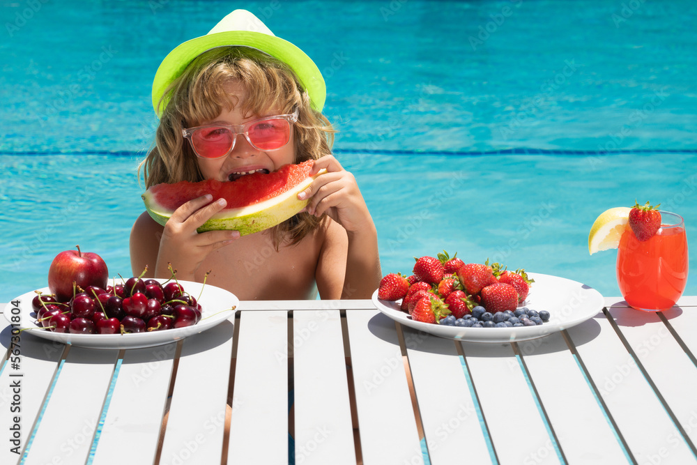Child eat watermelon. Kid with summer fruits in pool. Child in swimming pool playing and relaxed in water. Summer vacation with kids. Child eat watermelon. Kid with summer fruits in pool. Child in swimming pool playing and relaxed in water. Summer vacation with kids.