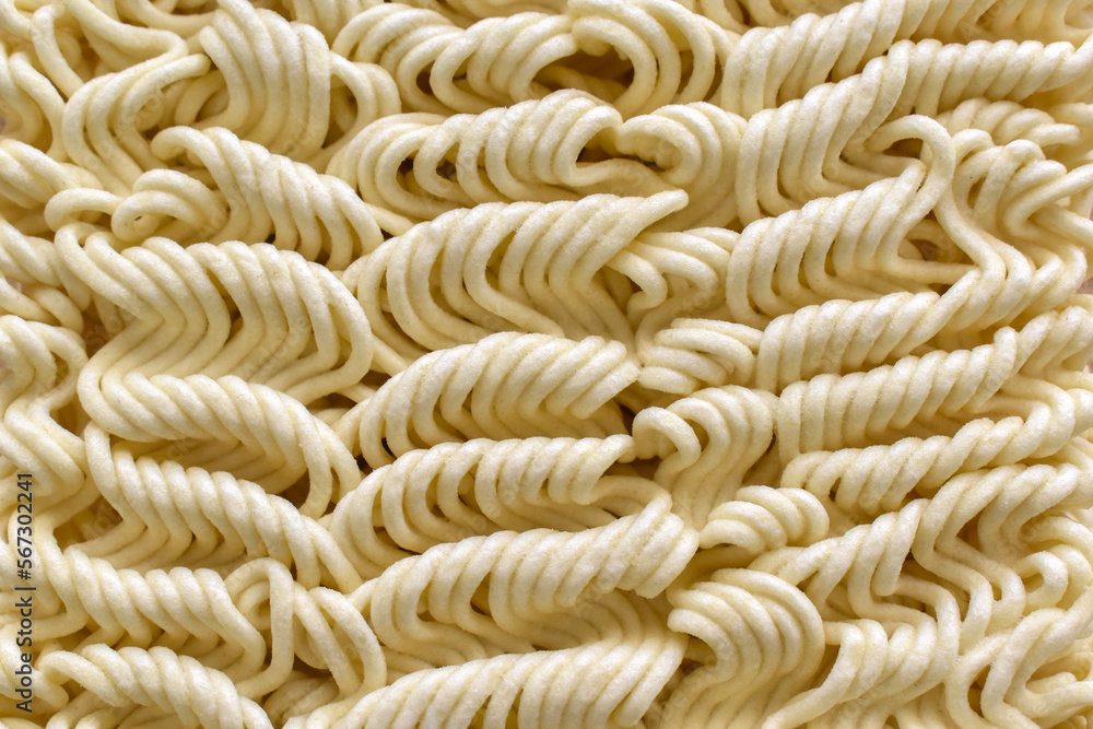 Uncooked instant noodles texture background. Uncooked instant noodles texture background.