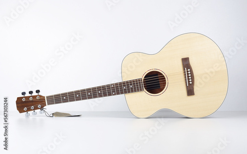 Musical instrument - Front view classic wooden left hand acoustic guitar