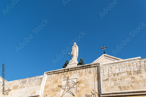 Statue of St.Catherine on the roof Church of Saint Catherine, Bethlehem © vadiml