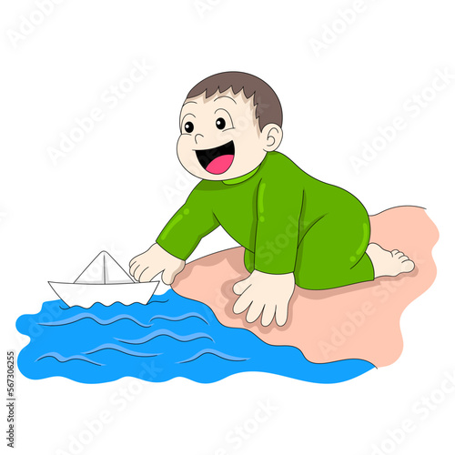 baby boy is playing paper boat in water happily