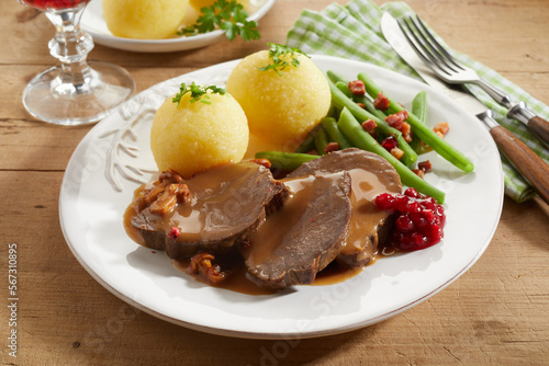 Meat with potato dumplings and green beans