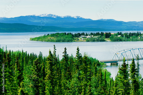 Alaska Highway and Nisutlin Bay Bridge across Teslin lake in Yukon territory, Canada photo