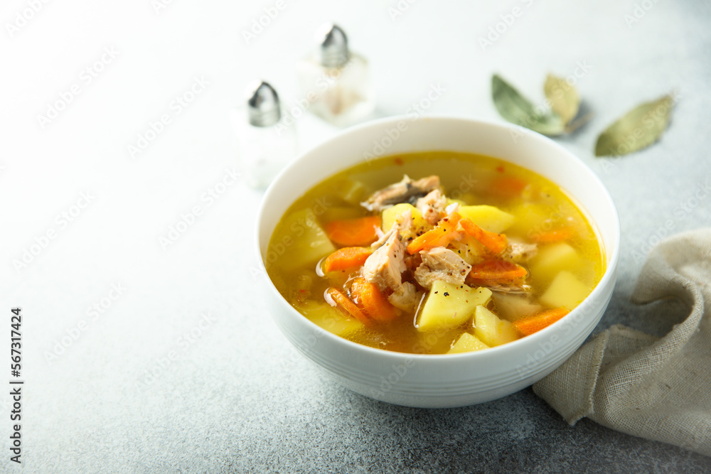 Traditional homemade fish soup with vegetables Traditional homemade fish soup with vegetables
