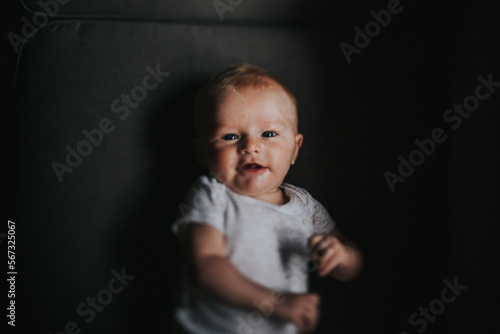 Portrait of baby boy with eye contact photo