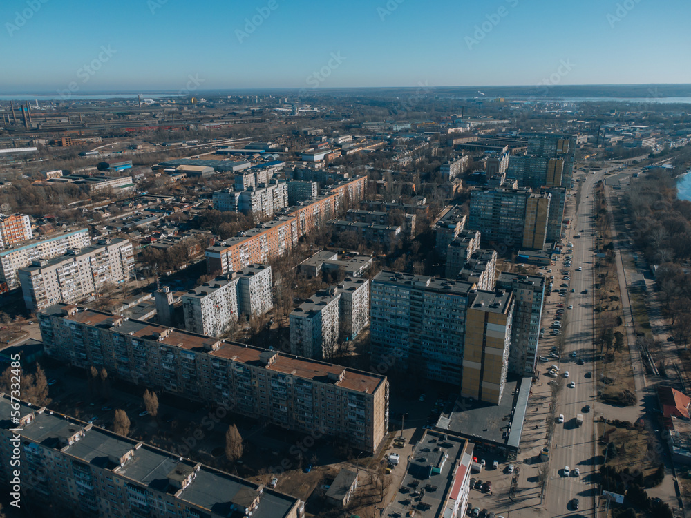 Fototapeta premium Top view of the left bank. Solnechny district, Dnipro, Ukraine. Residential houses, sleeping area. Panoramic view. Ukrainian city before the war.