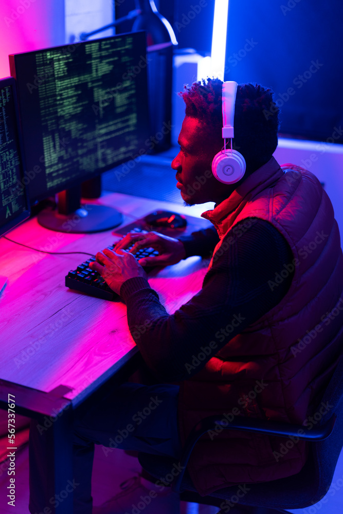 Software developer coding on his computer. Coding and hacking concept. Software developer coding on his computer. Coding and hacking concept.