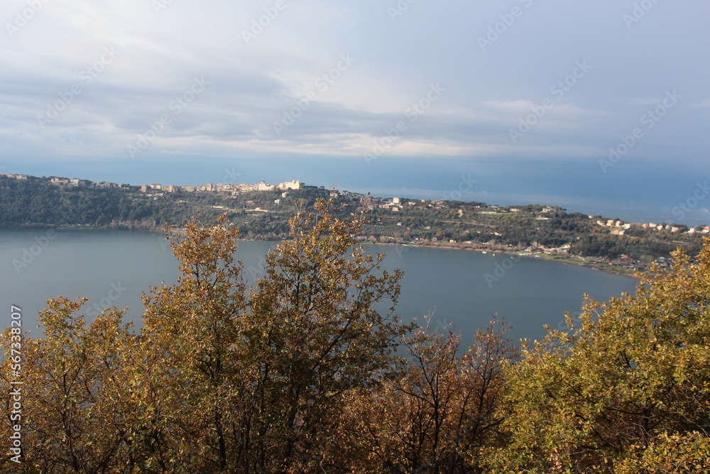 View of Albano lake near Castelgandolfo and the summer palace of the Pope, general view of Nemi lake and houses in Nemi town, fountain, sales counter of wild strawberries, Lazio Rome Italy
View of Albano lake near Castelgandolfo and the summer palace of the Pope, general view of Nemi lake and houses in Nemi town, fountain, sales counter of wild strawberries, Lazio Rome Italy