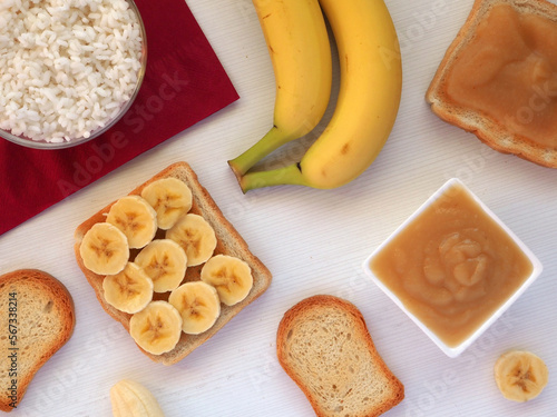 Foods included in the BRAT diet: bananas, rice, applesauce, toast.