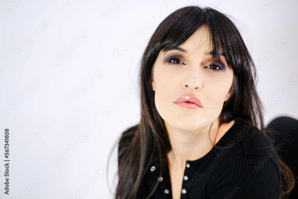 Feminine portrait young woman black dress white background successful lady Feminine portrait young woman black dress white background successful lady