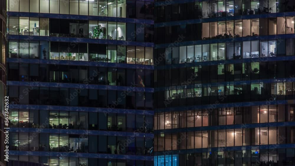 Close up view to glowing office windows in Skyscrapers International Business Center of City at night timelapse from top Close up view to glowing office windows in Skyscrapers International Business Center of City at night timelapse from top