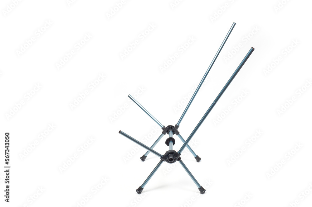 Folding quick-assembled lightweight travel chair on a white background. Folding quick-assembled lightweight travel chair on a white background.